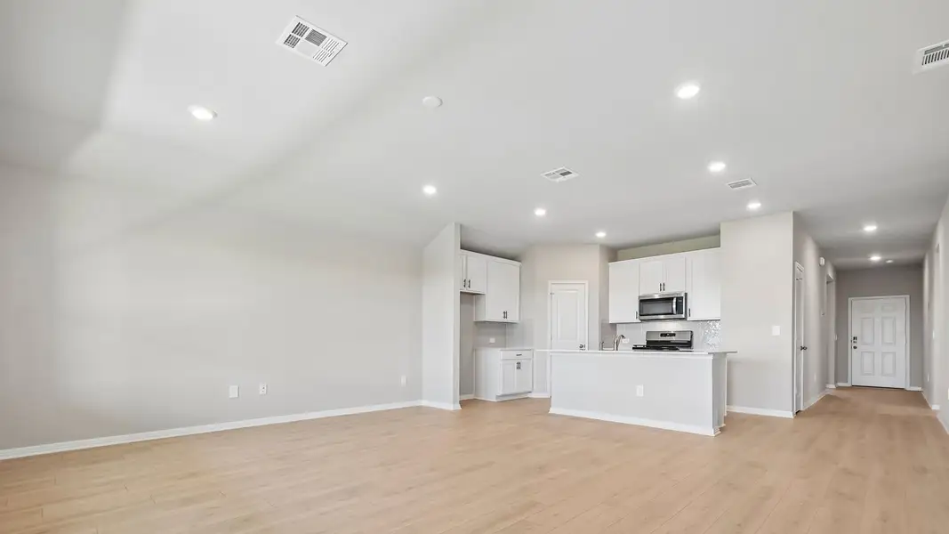 Spacious, unfurnished interior of a new home in Carillon, Manor (Image 13).