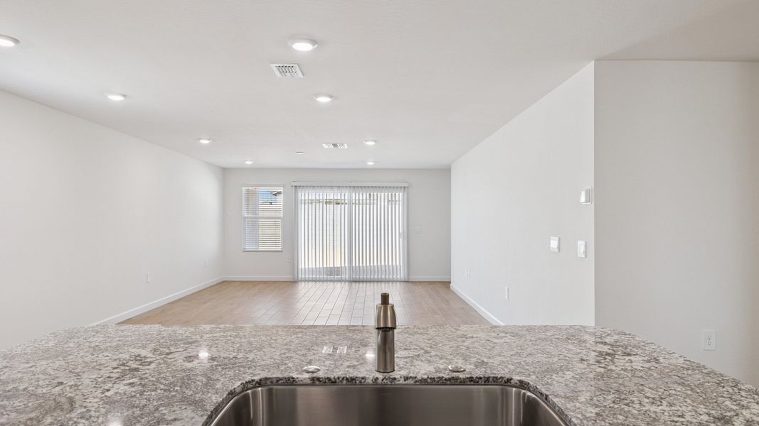 Representative unfurnished interior of a home built from the Gaven by D.R. Horton in The Ridge at Stone Butte, Phoenix (Image 18).