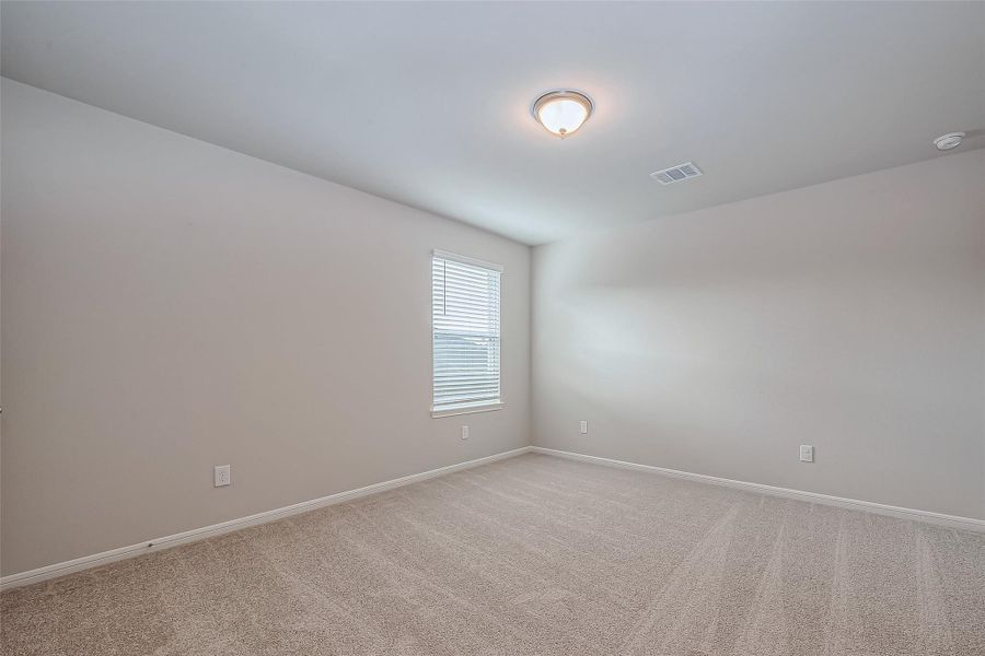 Spacious, unfurnished interior of a new home in Sunterra, Katy (Image 24).