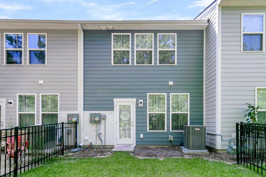 Front exterior of a new home in Boykins Run Townhomes, Moncks Corner, SC, highlighting curb appeal (Image 2). Front exterior of a new home in Boykins Run Townhomes, Moncks Corner, SC, highlighting curb appeal (Image 2).