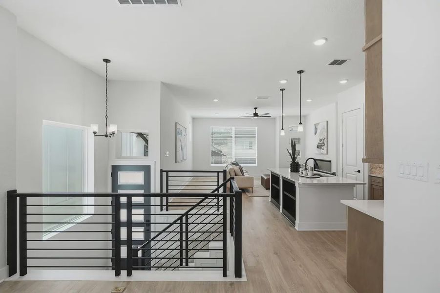 Furnished interior view inside a new home in Centero at Stone Oak, San Antonio (Image 23).