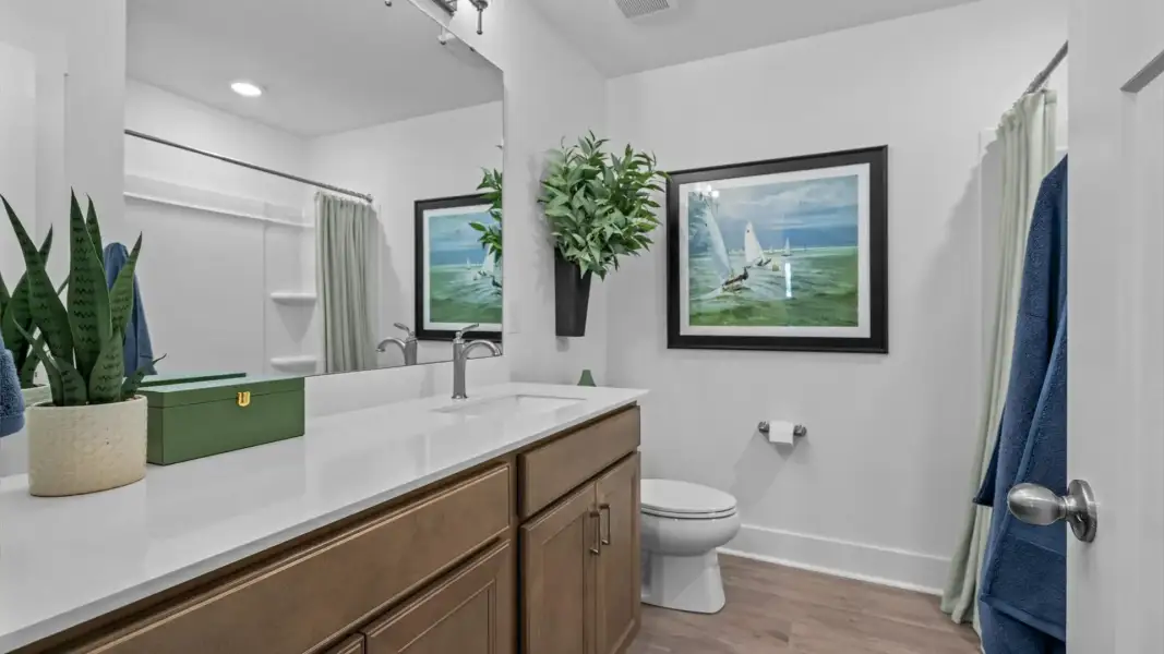 Furnished interior view inside a new home in Robert's Farm, Greenville (Image 18).