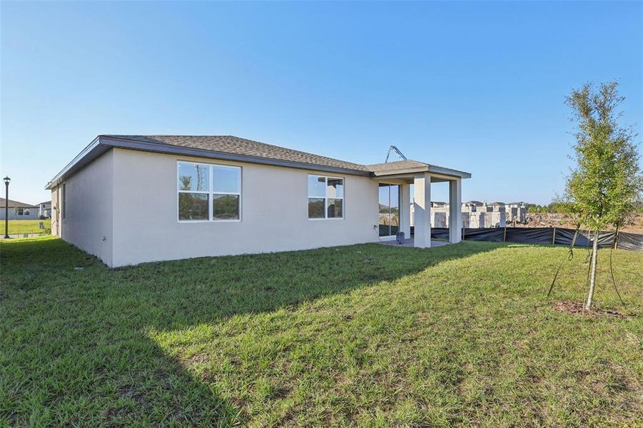 Exterior details and patio area of a home in The Meadow at Crossprairie, St. Cloud (Image 20).
