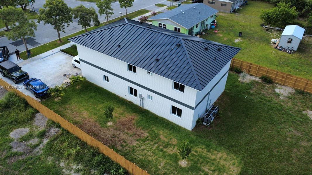 Front exterior of a new home in , Florida City, FL, highlighting curb appeal (Image 2). Front exterior of a new home in , Florida City, FL, highlighting curb appeal (Image 2).