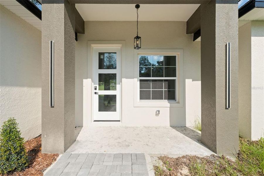 Front exterior of a new home in , Ocala, FL, highlighting curb appeal (Image 18). Front exterior of a new home in , Ocala, FL, highlighting curb appeal (Image 18).