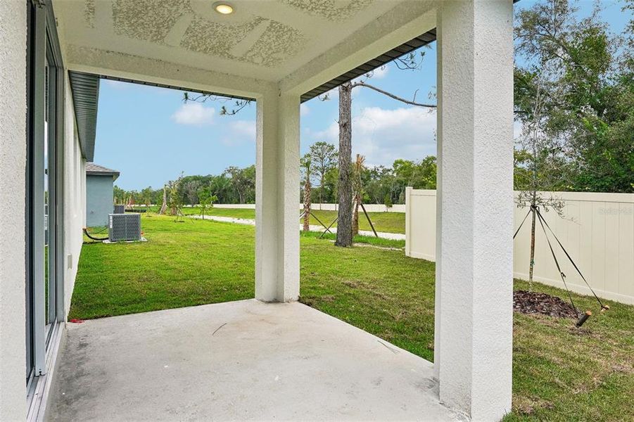 Exterior details and patio area of a home in Pine Ridge Meadows, Hudson (Image 4).