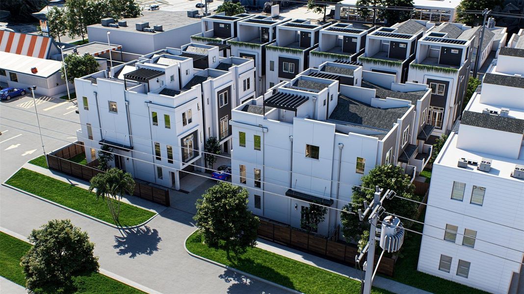 Modern townhouses with a sleek design are arranged in a compact community. Each unit features rooftop terraces, large windows, and contemporary finishes. The development is located on Val Verde, offering easy access to amenities and urban conveniences.