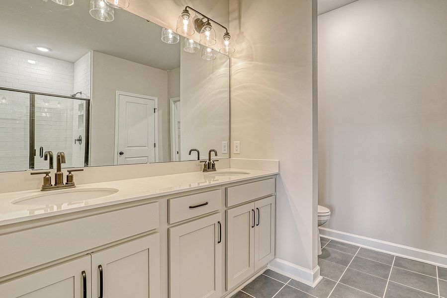Representative furnished interior of a home built from the Washington by Ashton Woods in Watson Hill, Summerville (Image 6).