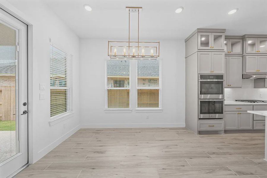 Representative unfurnished interior of a home built from the Madison by Chesmar Homes in Grange, Katy (Image 21).