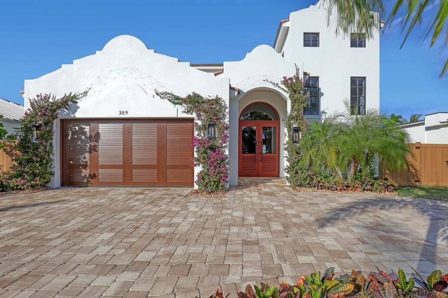 Front exterior of a new home in , Palm Beach Shores, FL, highlighting curb appeal (Image 25). Front exterior of a new home in , Palm Beach Shores, FL, highlighting curb appeal (Image 25).
