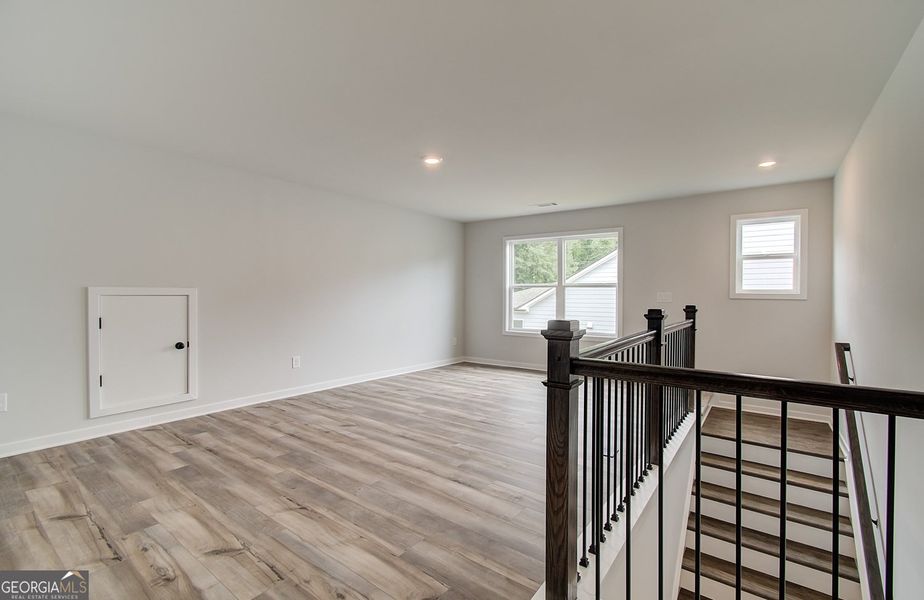 Spacious, unfurnished interior of a new home in Ponderosa Farms Reserve, Gainesville (Image 40).