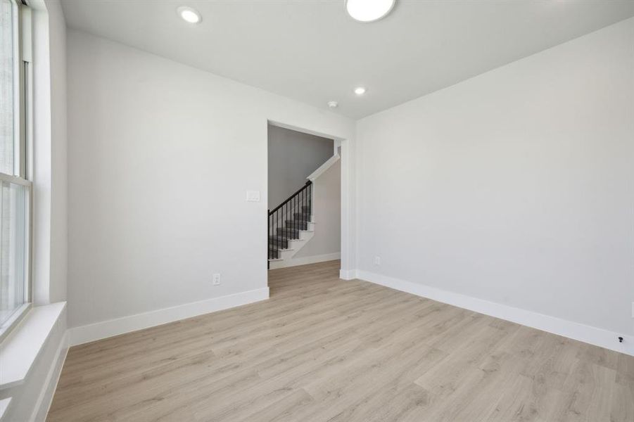 Spare room featuring light hardwood / wood-style floors