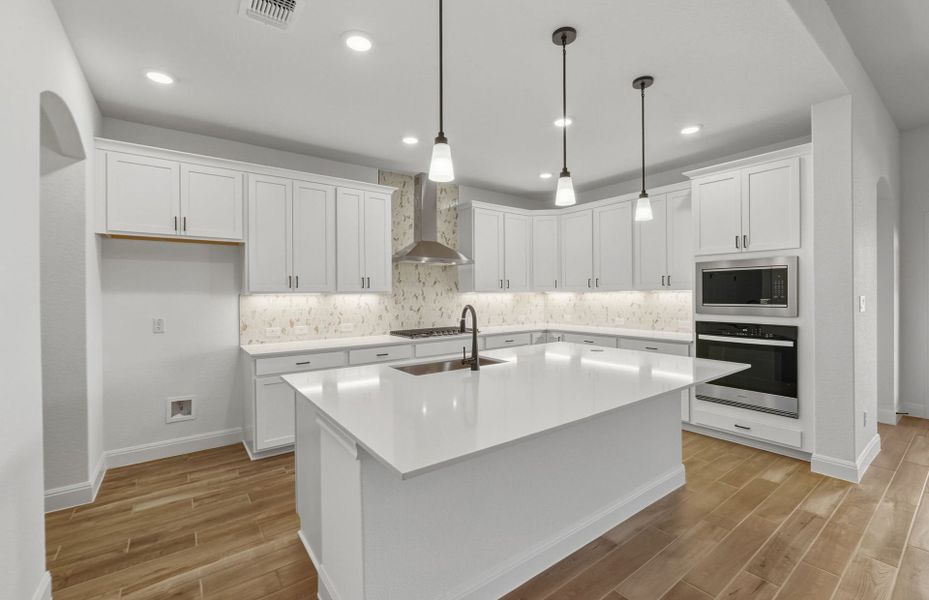 Furnished interior view inside a new home in Saddleback at Santa Rita Ranch, Liberty Hill (Image 13). Furnished interior view inside a new home in Saddleback at Santa Rita Ranch, Liberty Hill (Image 13).