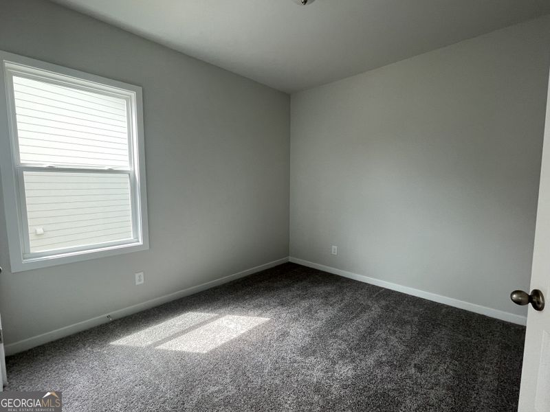 Spacious, unfurnished interior of a new home in Enclave at Logan Point, Loganville (Image 26).