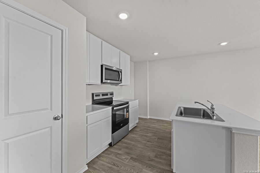 Furnished interior view inside a new home in Swenson Heights, Seguin (Image 9).