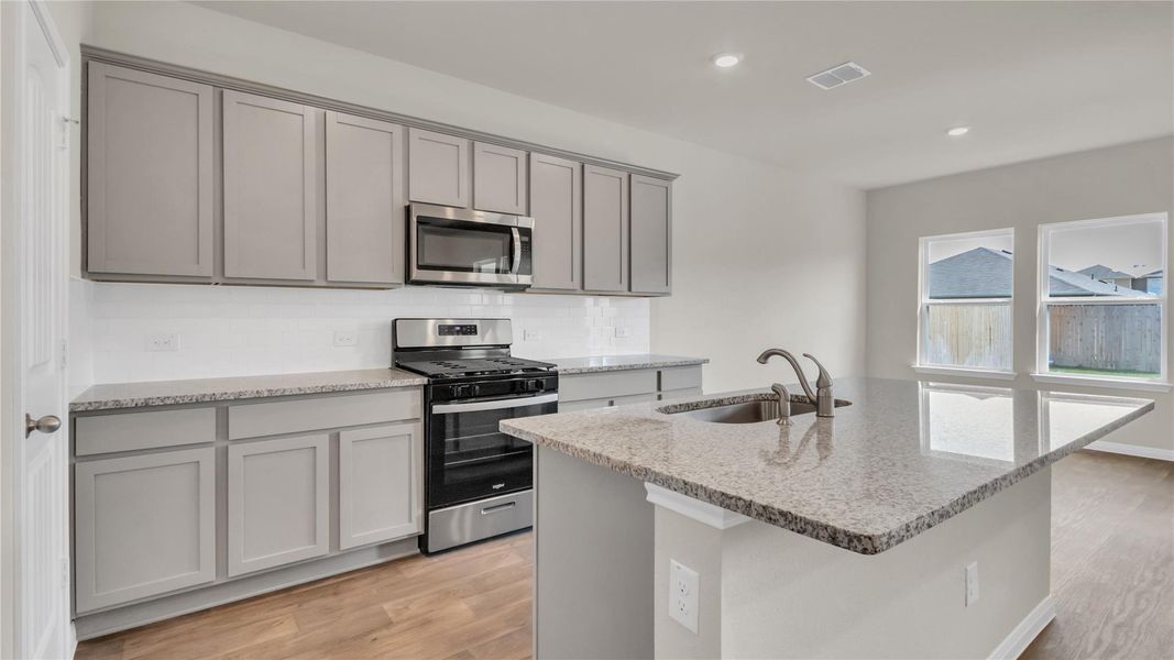 Furnished interior view inside a new home in Carillon, Manor (Image 6).