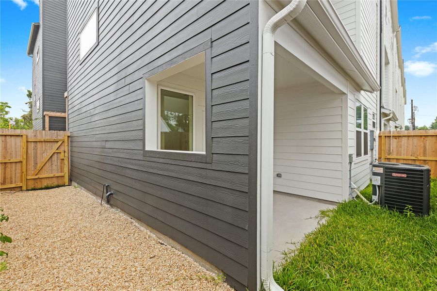 Exterior details and patio area of a home in , Houston (Image 18). Exterior details and patio area of a home in , Houston (Image 18).