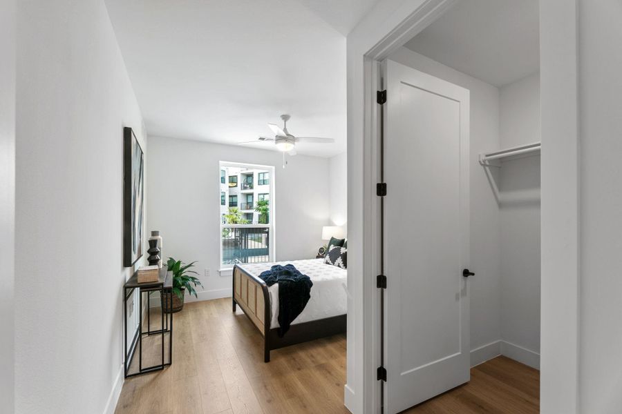 Primary bedroom with walk-in closet.