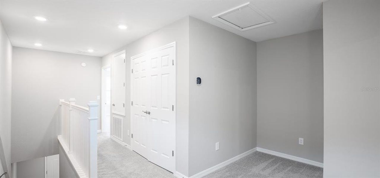 Spacious, unfurnished interior of a new home in The Crossings - Bungalows, St. Cloud (Image 13).