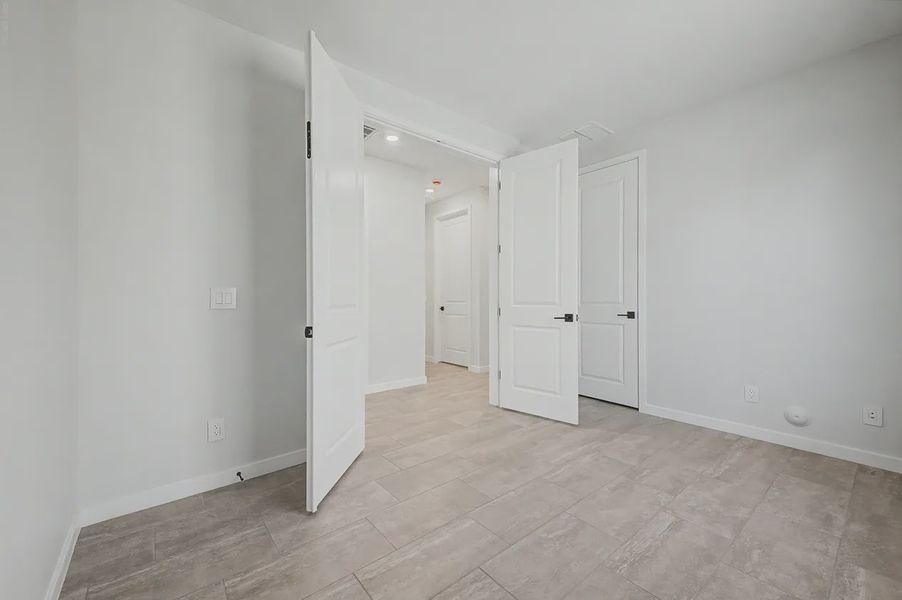Spacious, unfurnished interior of a new home in Avanti at Granite Vista, Waddell (Image 32).