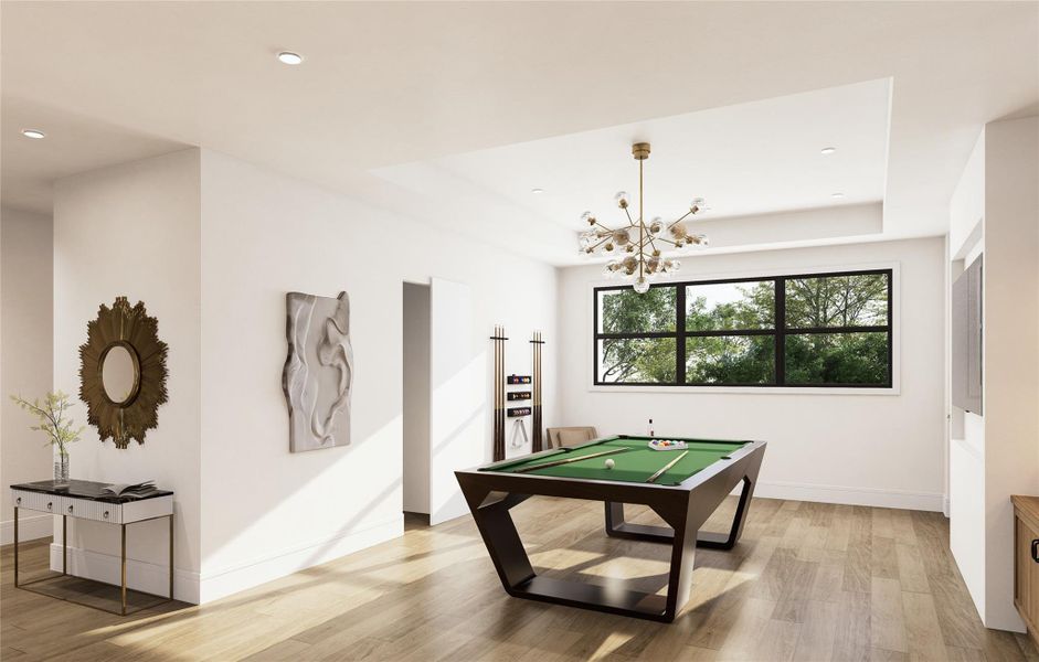 Bright, open, and designed for leisure, this upper-level game room blends modern elegance with functional fun. Large windows frame treetop views, while the pool table and mid-century lighting set the tone for stylish recreation. There's room to gather, relax, or entertain in effortless comfort.
