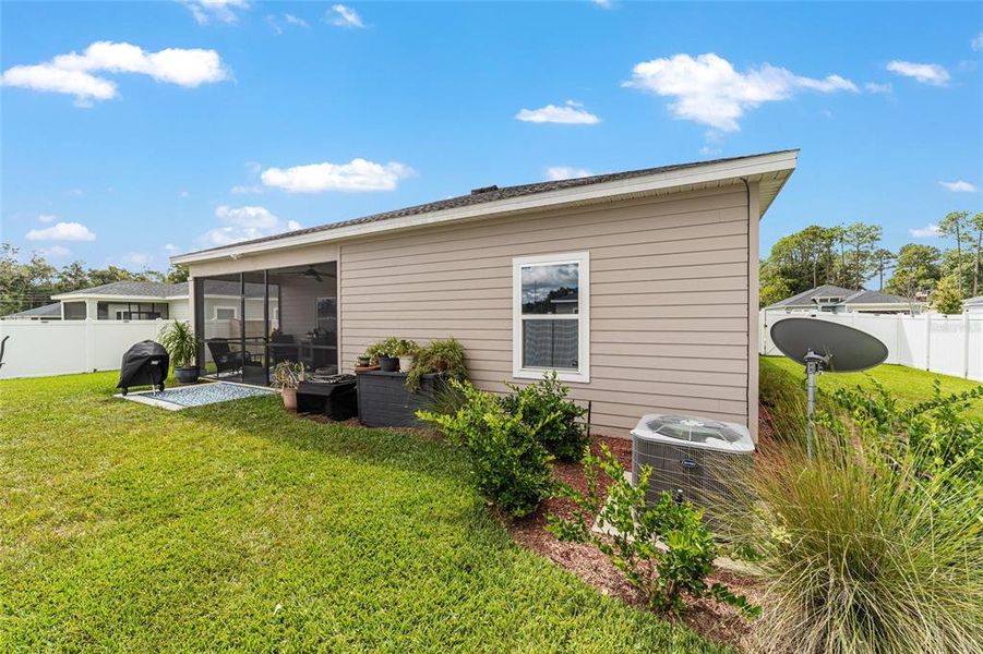 Exterior details and patio area of a home in Country Lane Estates, Williston (Image 21).