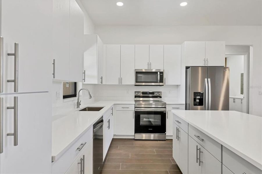Furnished interior view inside a new home in , Port Charlotte (Image 13). Furnished interior view inside a new home in , Port Charlotte (Image 13).