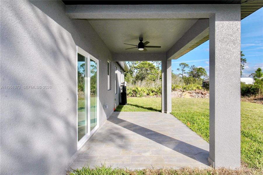 Exterior details and patio area of a home in , Sebring (Image 24).