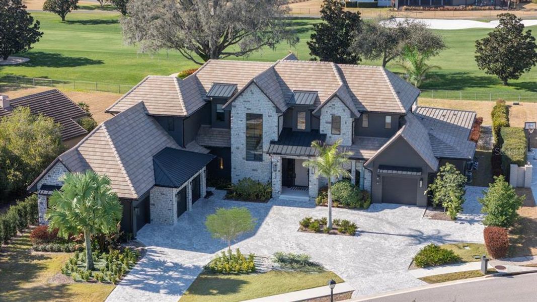 Front exterior of a new home in , Orlando, FL, highlighting curb appeal (Image 27).