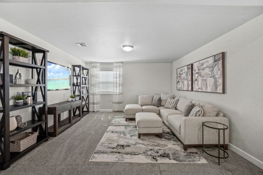 Representative furnished interior of a home built from the Capitan by Hakes Brothers in Hillside Park, El Paso (Image 31).