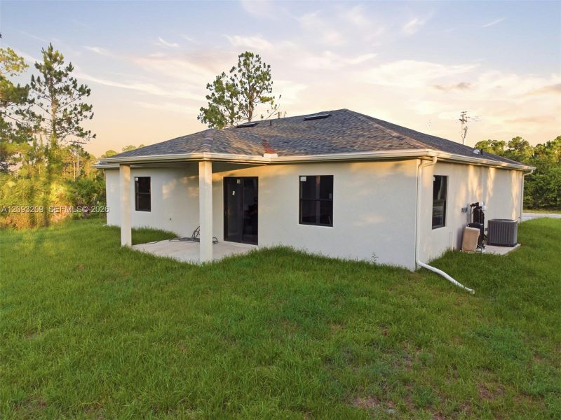 Exterior details and patio area of a home in , Lehigh Acres (Image 30).