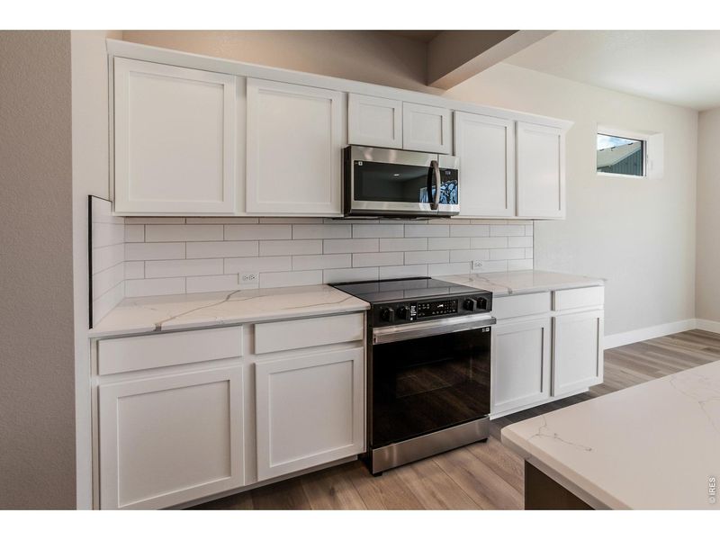 Furnished interior view inside a new home in Wilson Commons, Loveland (Image 8).