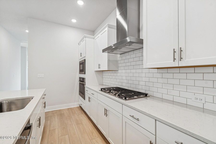 Furnished interior view inside a new home in Kettering at eTown - Paired Villas, Jacksonville (Image 10).