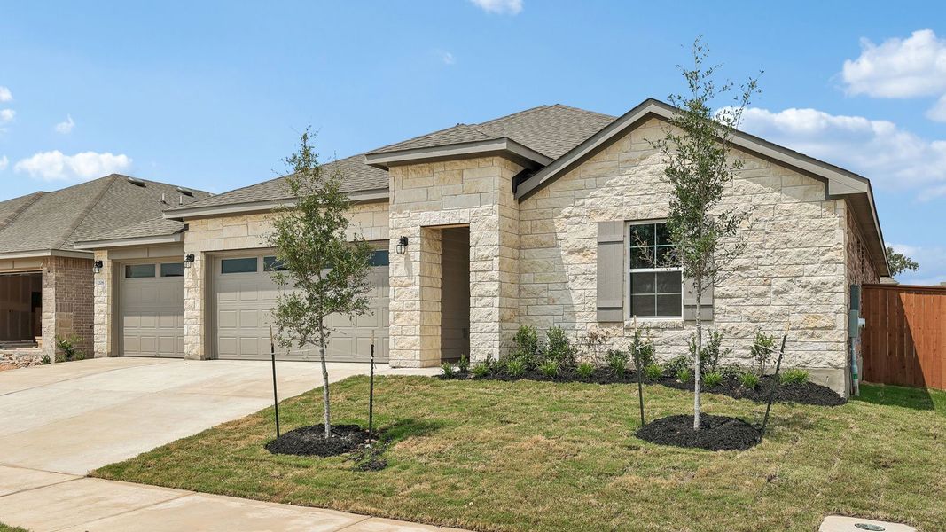 Front exterior of a new home in Riverview, Georgetown, TX, highlighting curb appeal (Image 19). Front exterior of a new home in Riverview, Georgetown, TX, highlighting curb appeal (Image 19).