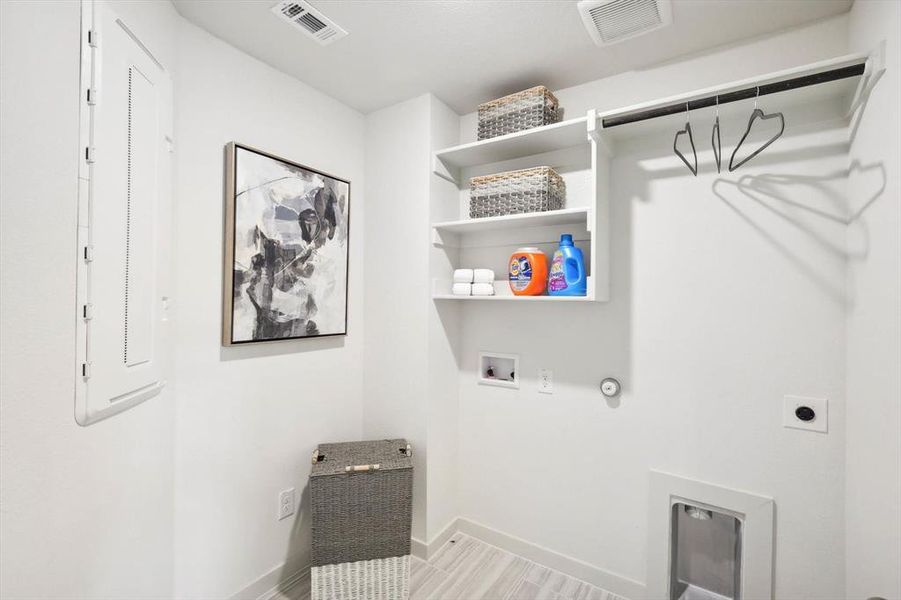 Laundry room featuring hookup for a washing machine, hookup for a gas dryer, and hookup for an electric dryer
