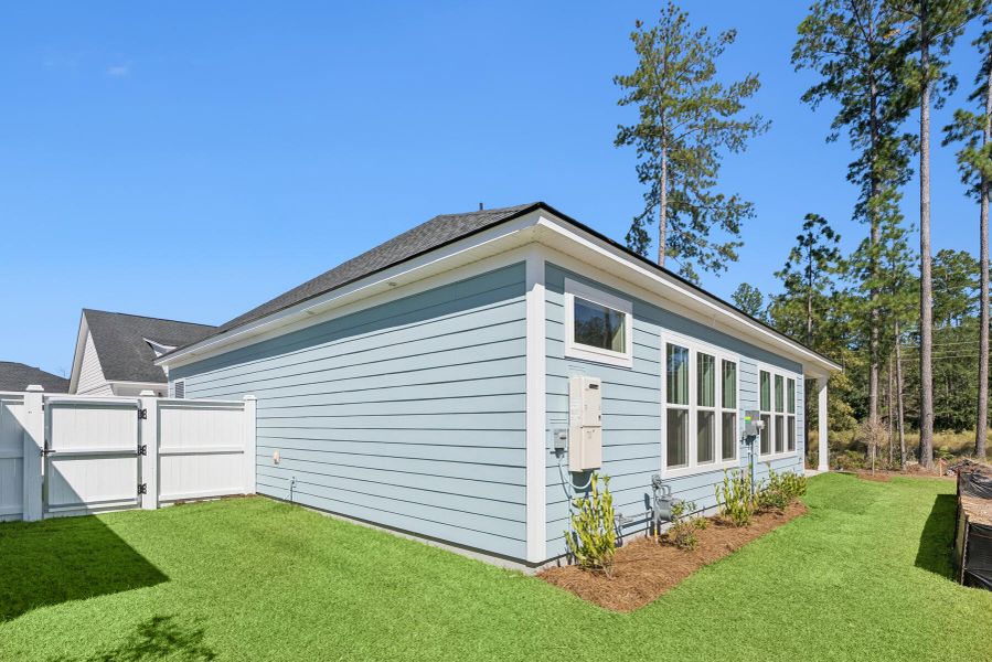 Exterior details and patio area of a home in Nexton – Midtown – The Garden Collection, Summerville (Image 3). Exterior details and patio area of a home in Nexton – Midtown – The Garden Collection, Summerville (Image 3).