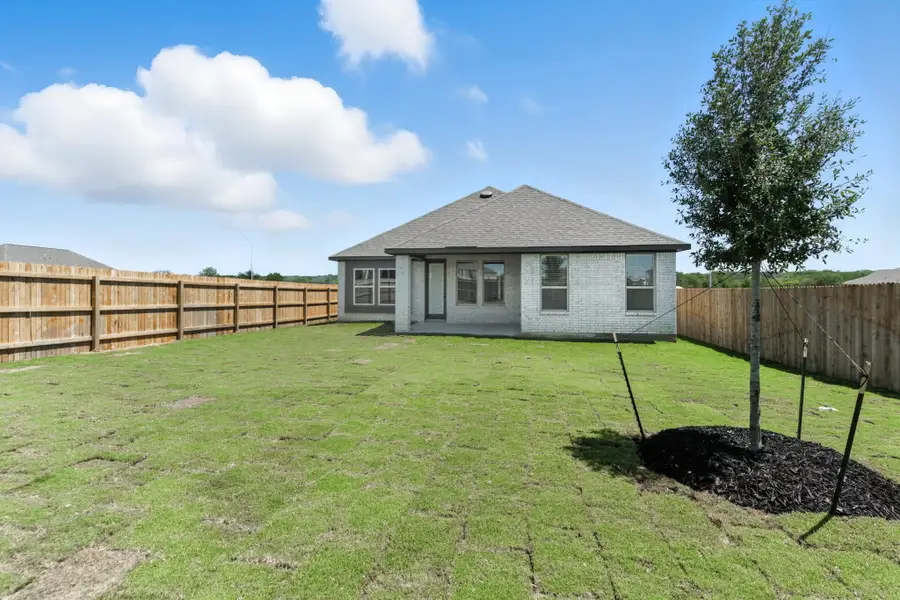 Representative exterior photo of a completed home built from the Aspen by Chesmar Homes in Alsatian Oaks, Castroville, TX (Image 2).