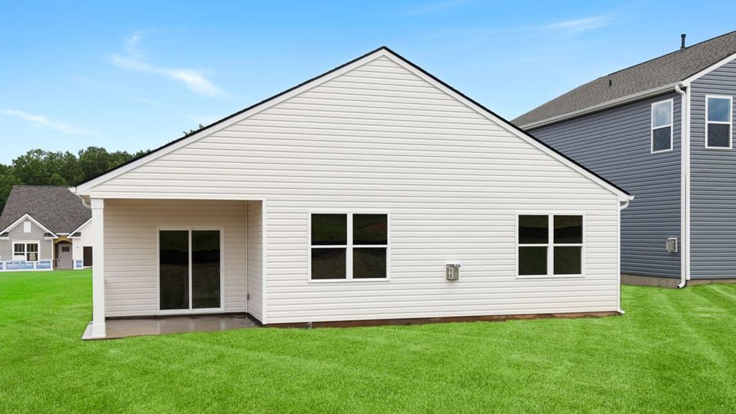 Exterior details and patio area of a home in Sherwood Gardens, Landrum (Image 4).