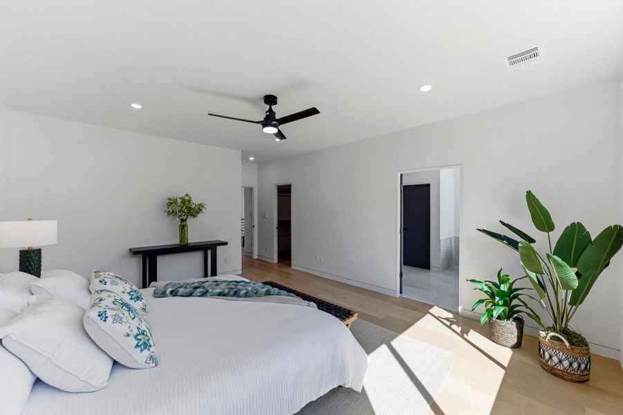 Bedroom featuring recessed lighting, ceiling fan, and wood finished floors