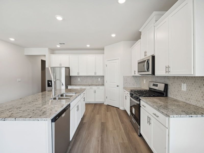 Furnished interior view inside a new home in Martin Springs - Estate Series, Lawrenceville (Image 9).