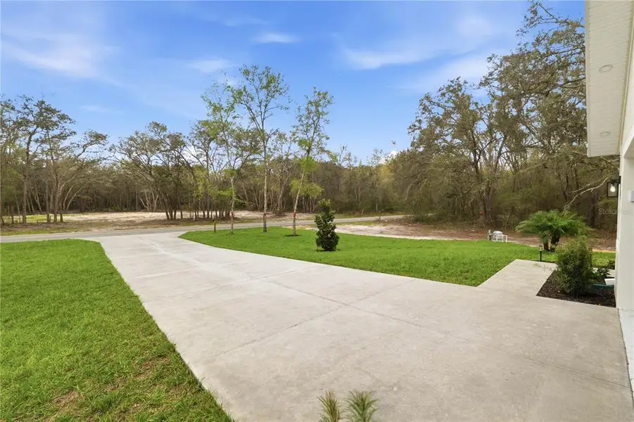 Exterior details and patio area of a home in , Webster (Image 4).