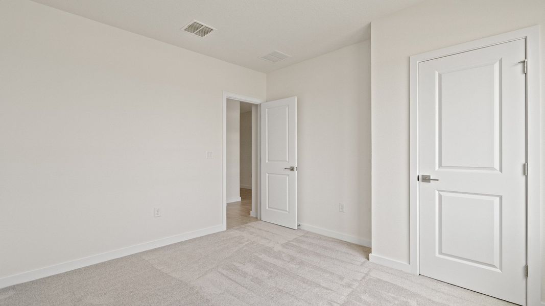 The Atwood Guest Bedroom by DRB Homes in Hamilton Bluff, Haines City, FL The Atwood Guest Bedroom by DRB Homes in Hamilton Bluff, Haines City, FL