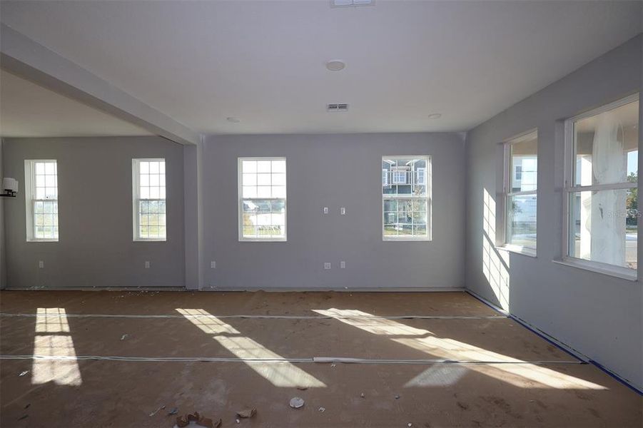 In-progress construction of a new home in Center Lake on the Park, St. Cloud, FL (Image 18).