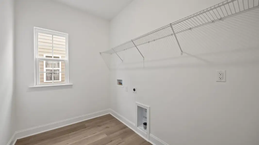 The Brentwood Plan by DRB Homes in River District, Charlotte NC.- Laundry
