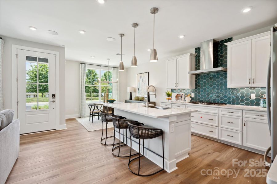 Front Entry Leads to Kitchen Through 8' Doorway. *Model Photos | Actual Finishes, Structural Selections, and Orientation May Vary.