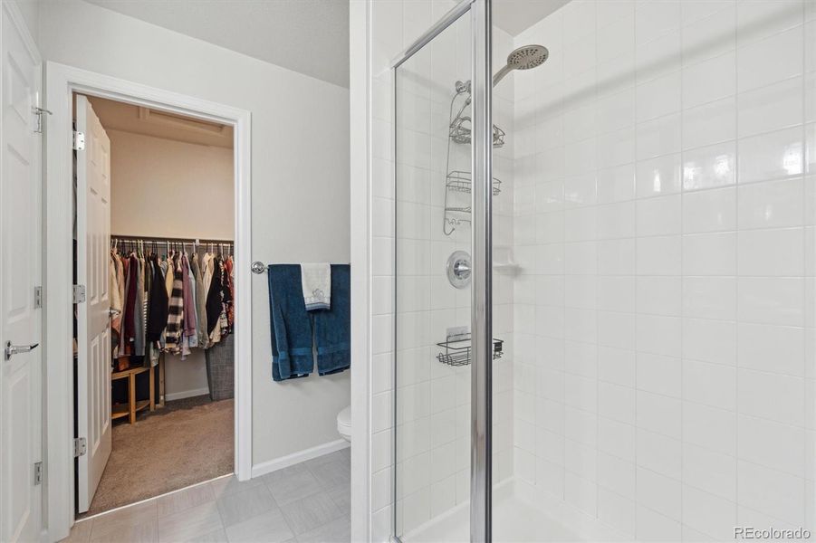 Primary En-suite bathroom with walk-in closet