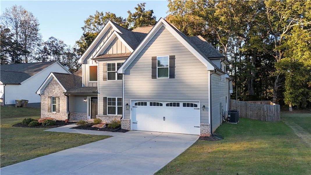 Front exterior of a new home in , Winder, GA, highlighting curb appeal (Image 2). Front exterior of a new home in , Winder, GA, highlighting curb appeal (Image 2).