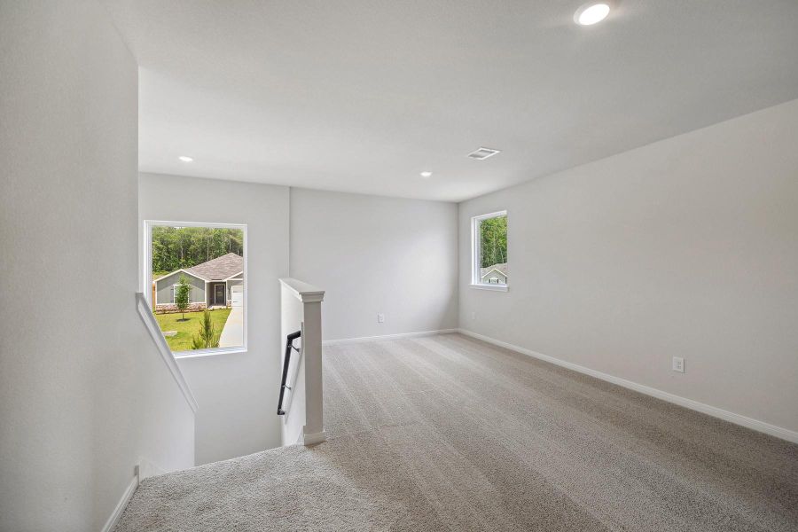 Spacious, unfurnished interior of a new home in Trails at Cochran Ranch, Waller (Image 5).