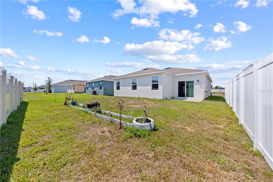 Exterior details and patio area of a home in Cypress Park Estates, Haines City (Image 4).