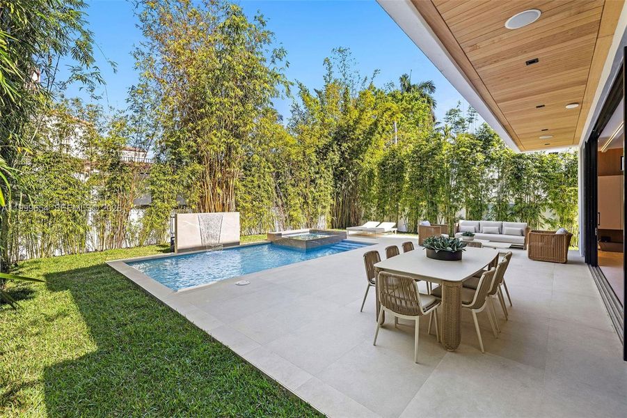 Exterior details and patio area of a home in , Miami Beach (Image 24). Exterior details and patio area of a home in , Miami Beach (Image 24).
